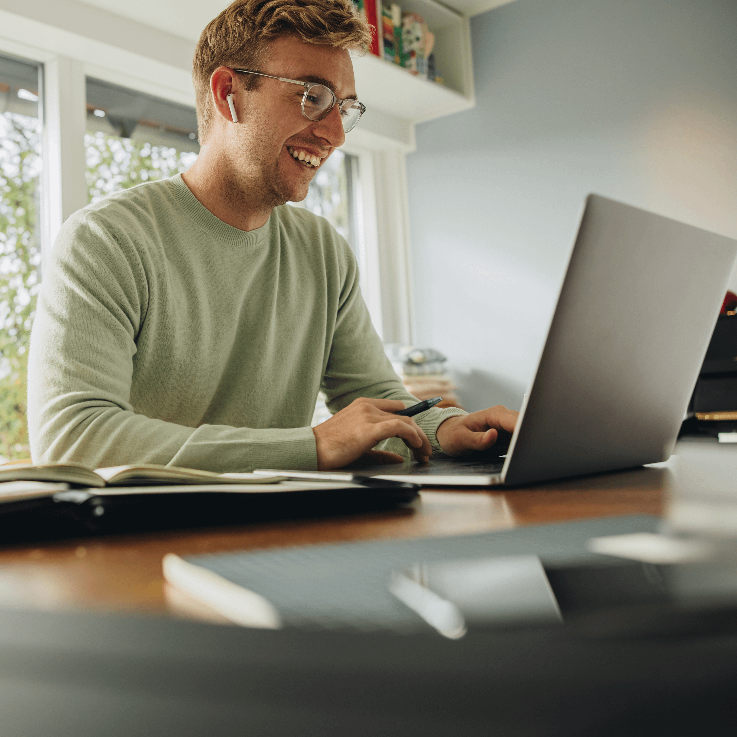 man on laptop with headphone