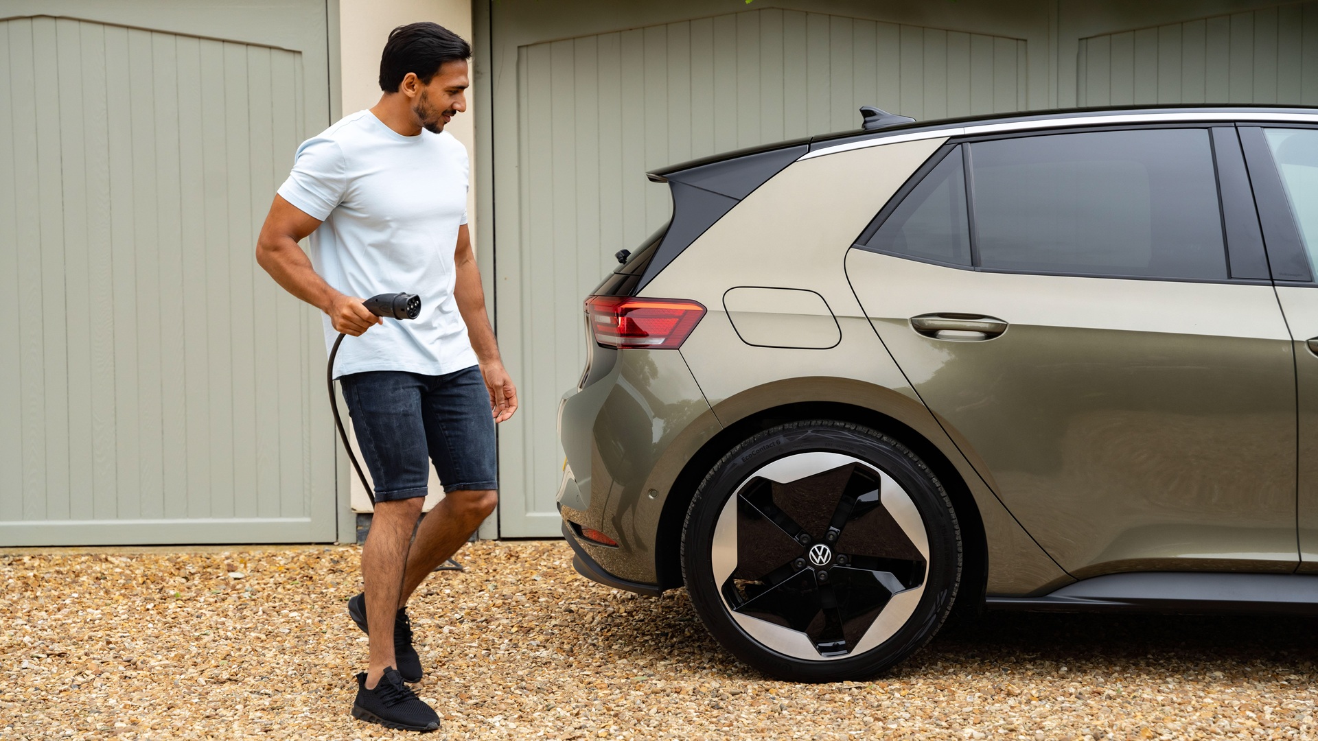 Person putting Volkswagen ID.3 On Charge