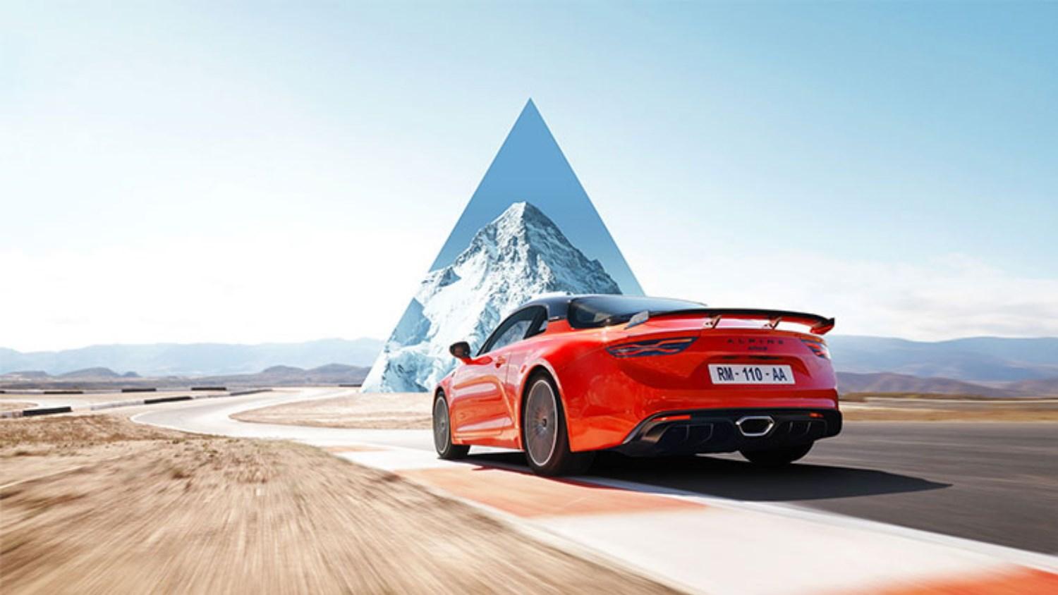 red Alpine A110S from behind with mountain