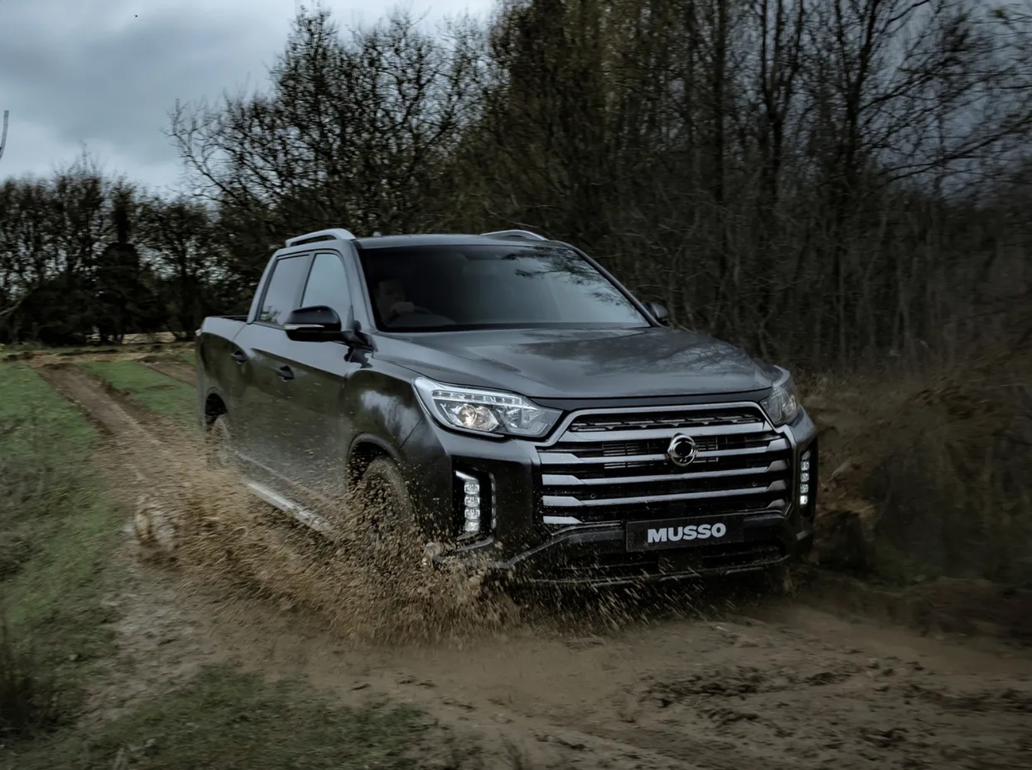 KGM Musso driving offroad