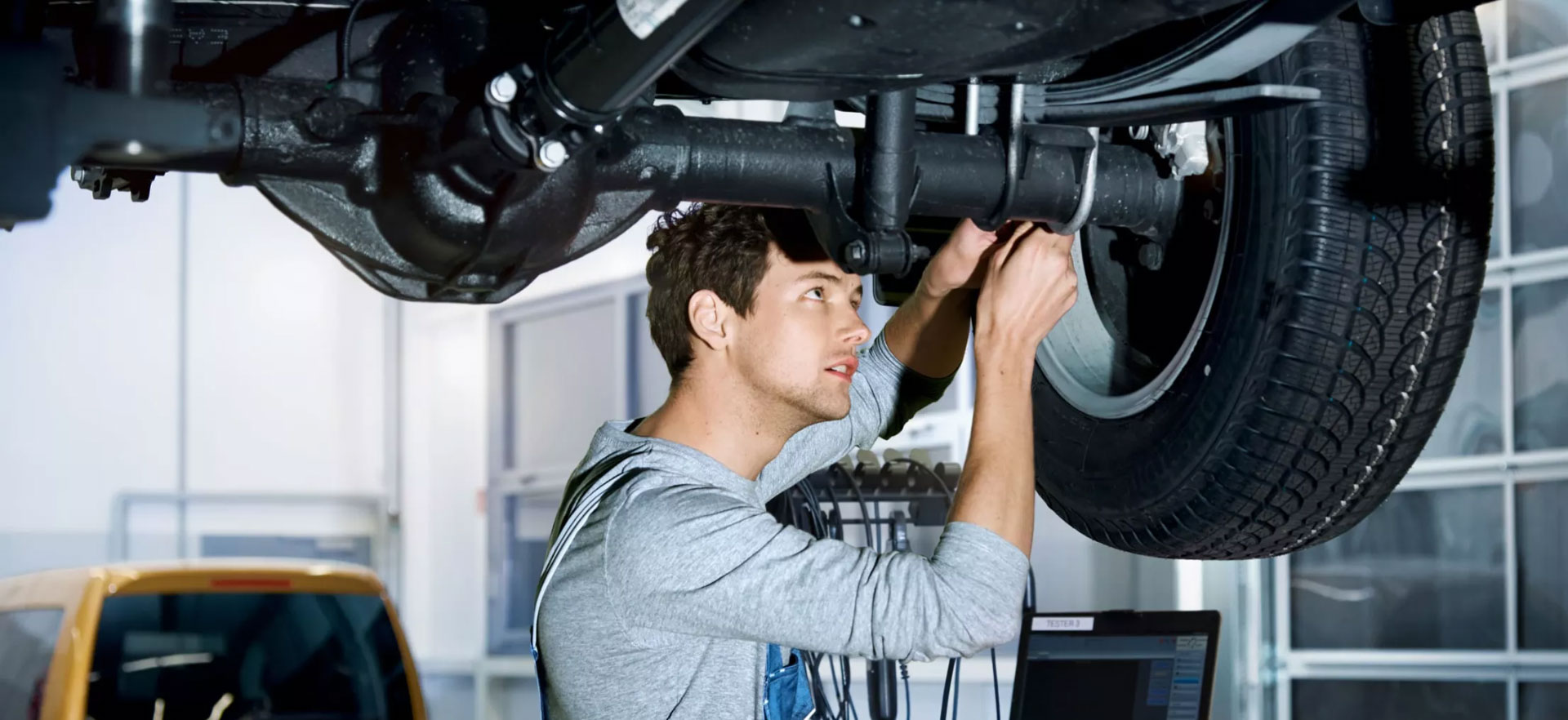 Volkswagen Mechanic Under Vehicle