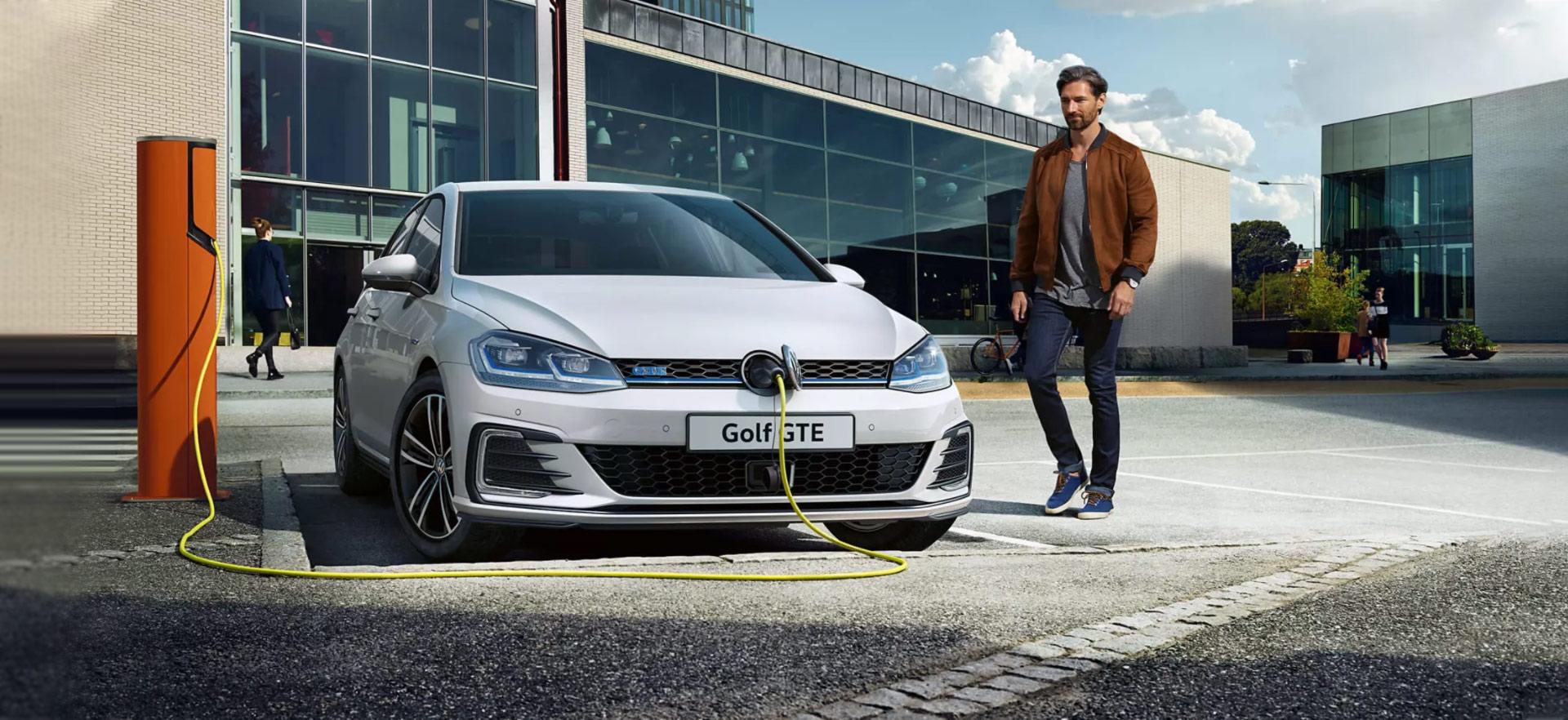 White Volkswagen Golf GTE on charge