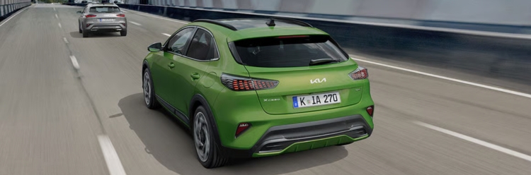 Kia Stonic Rear View Driving In An Urban Road