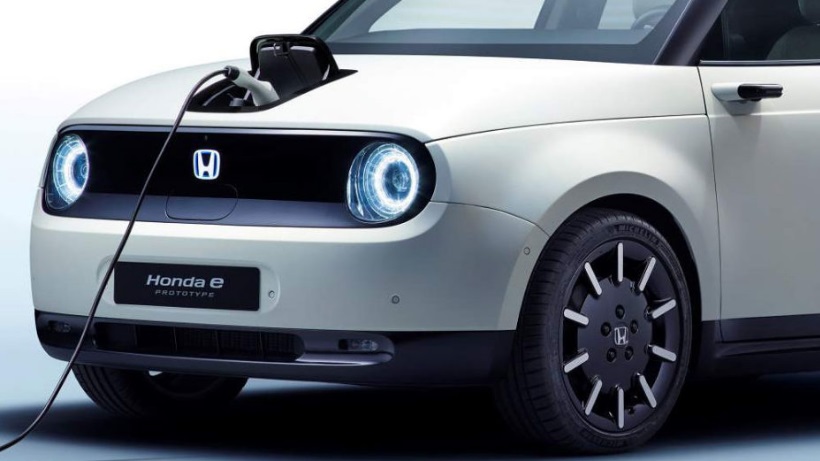 Honda e White front charging