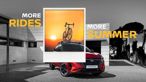 Banner saying "More Rides, More summer" with a photo of a bike on a roof rack on a Nissan Qashqai