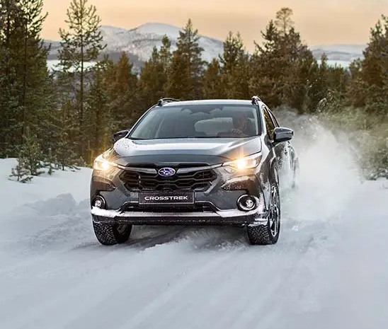 Black Subaru Crosstrek in snow