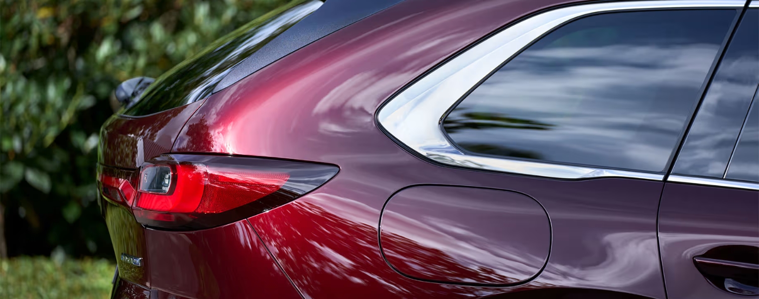 Mazda CX-80 rear view highlighting tail lights and rear windows.