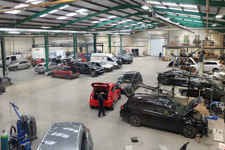 vehicles in bodyshop