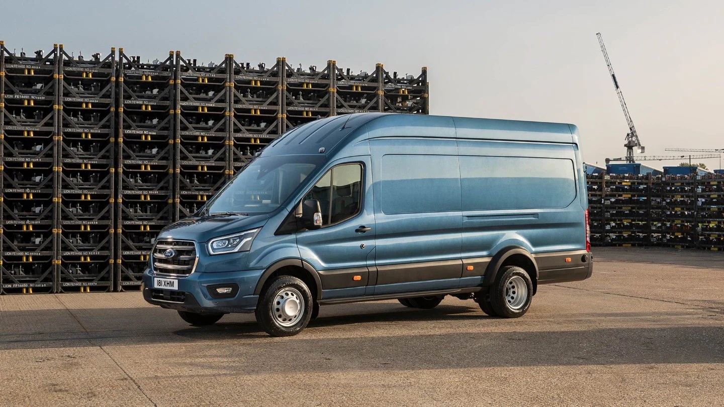 Blue Ford Transit Van parked on building site