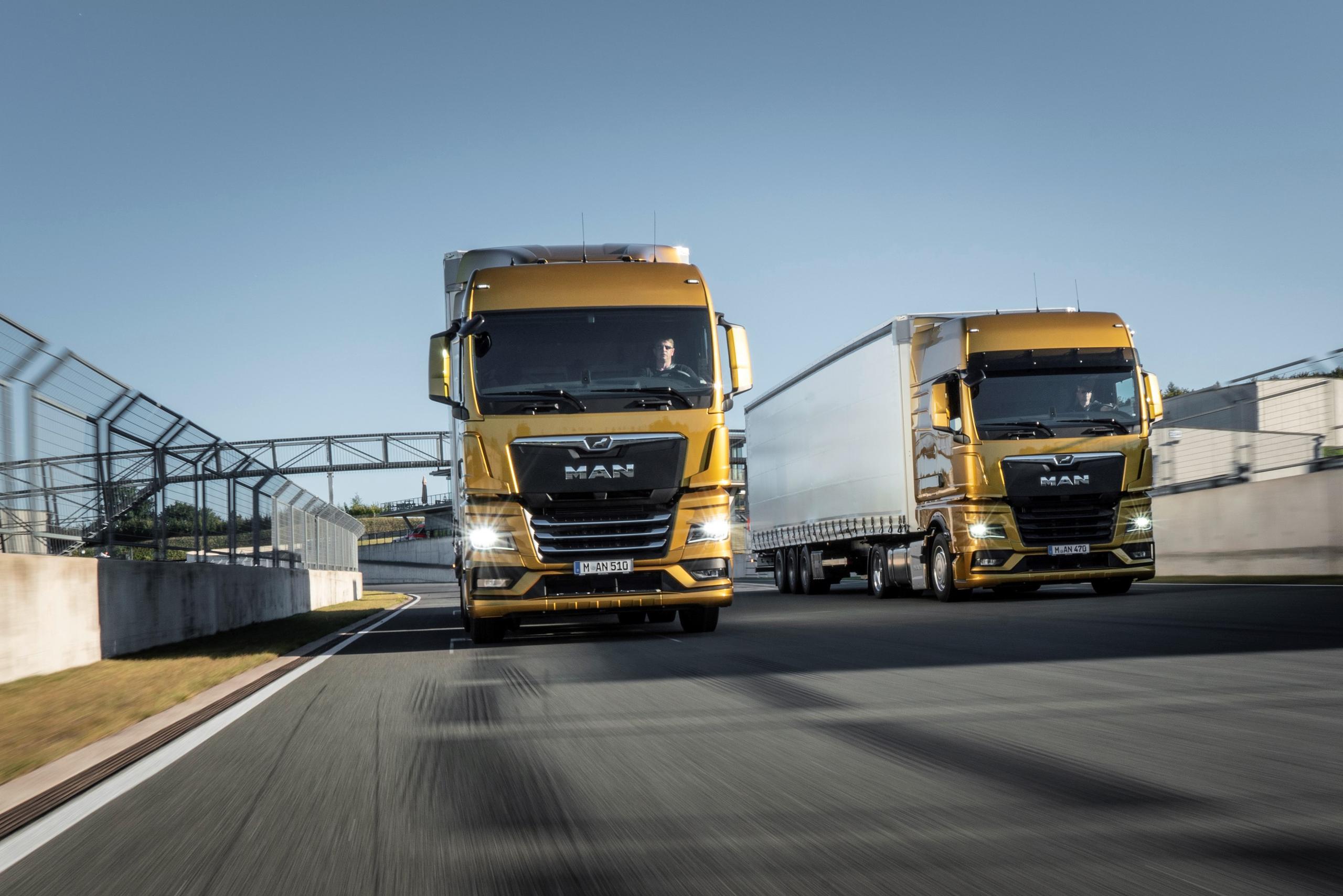 Two Golden MAN Truck