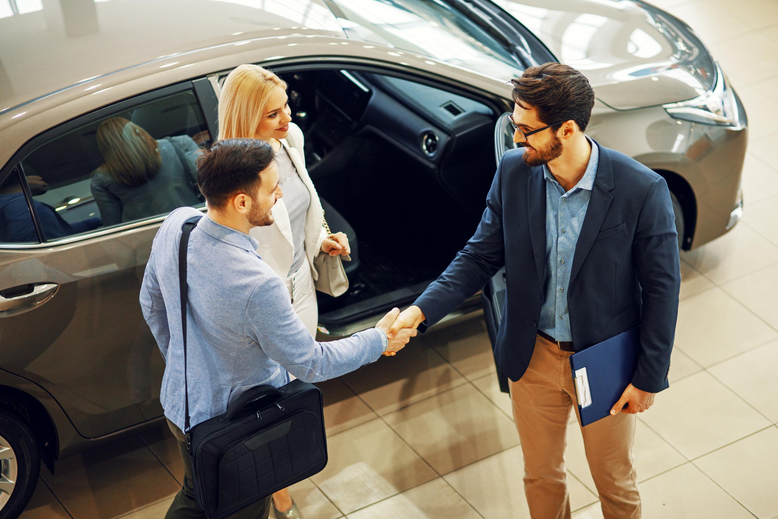 Man shaking another mans hand