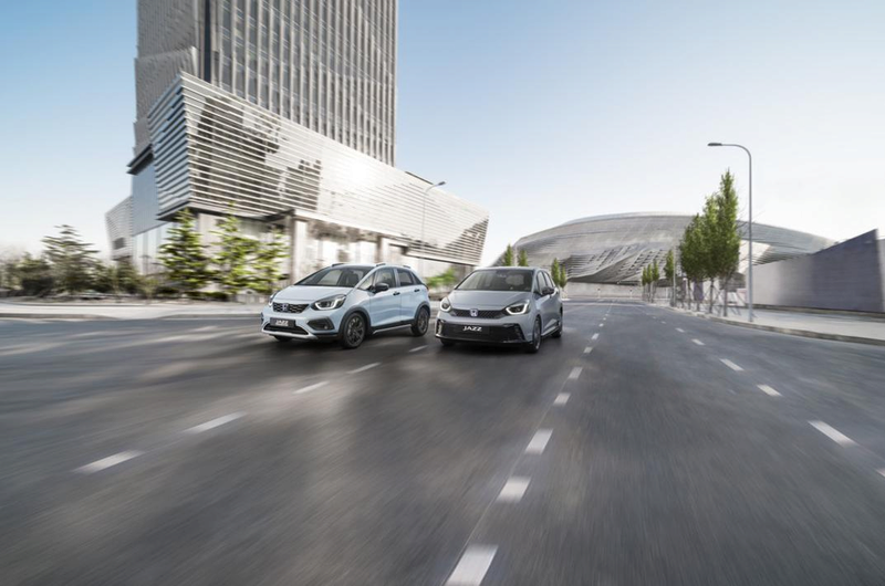Two Honda Jazz Hybrids Driving