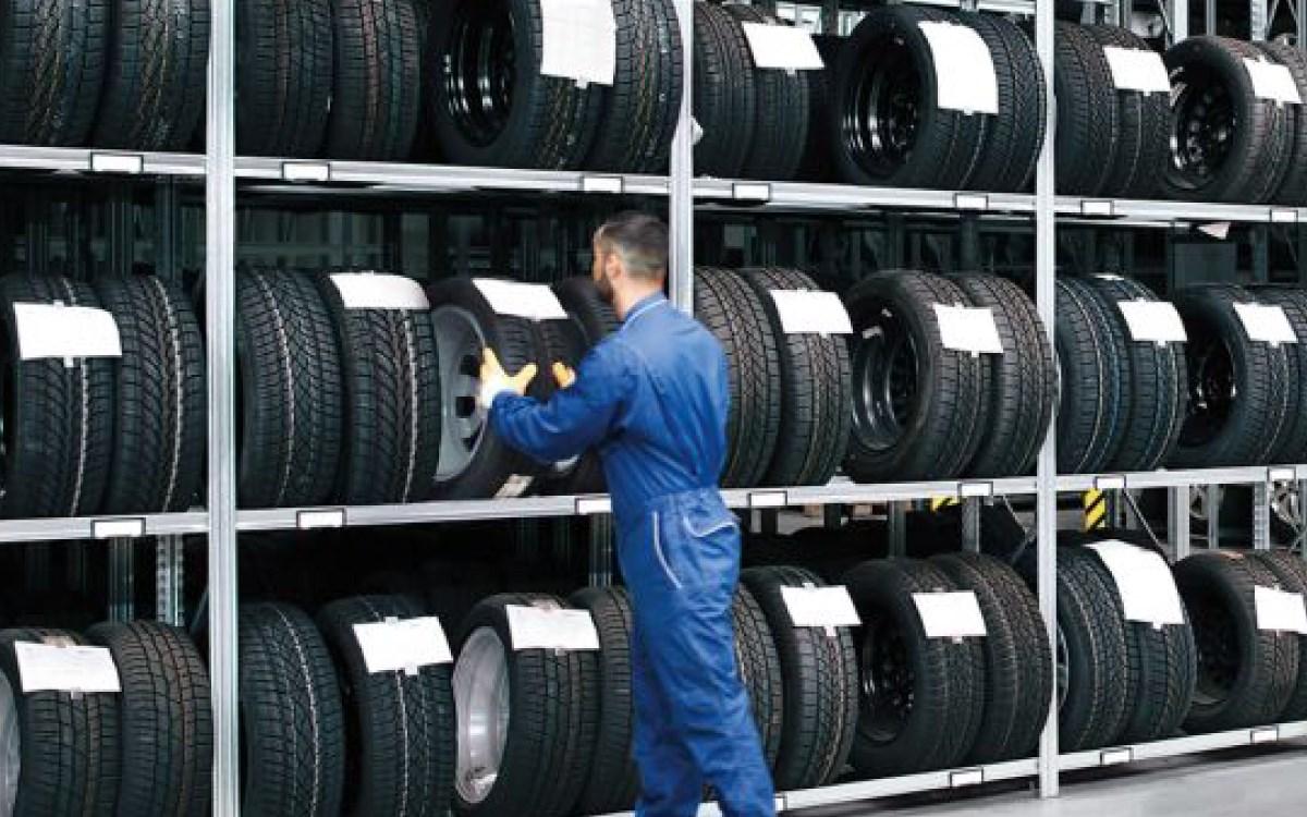 Volkswagen Mechanic grabbing tyre