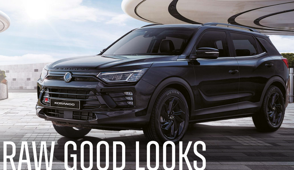 KGM Korando K35 in black with text saying Raw Good Looks