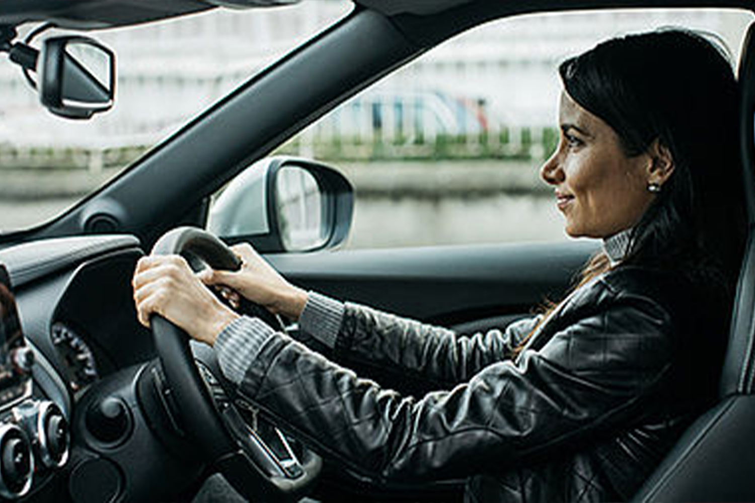 lady sat in nissan car