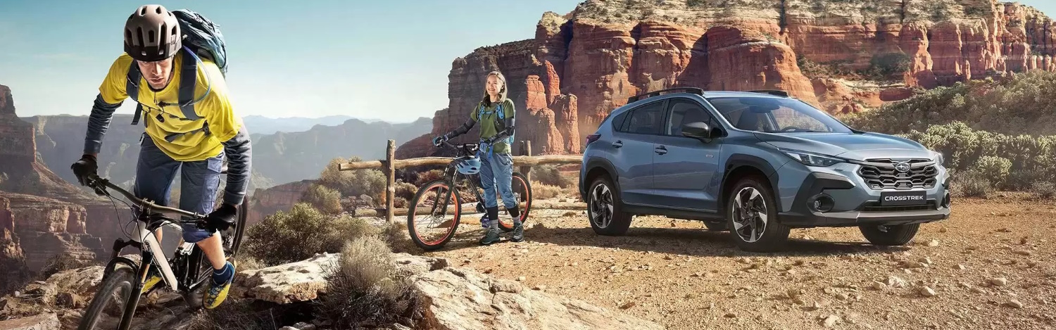 cyclist beside Subaru New Crosstrek