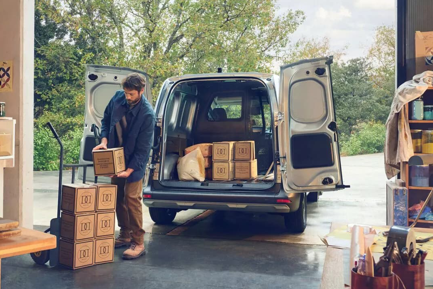 Man loading boxes in van