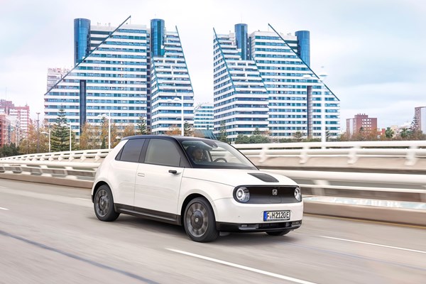 Honda e White on the road