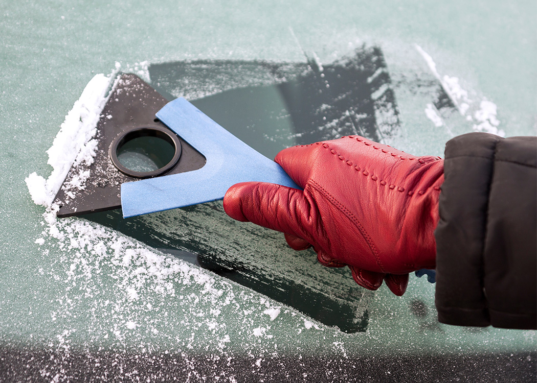deicing car with ice scraper