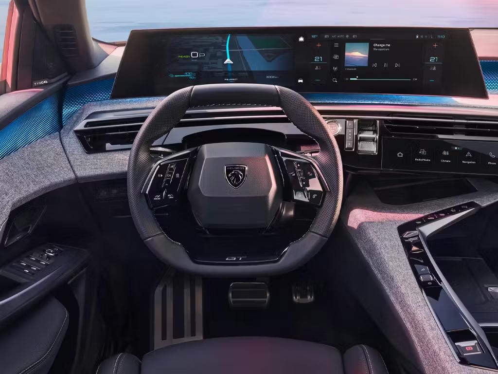 Peugeot 3008 interior featuring the panoramic Peugeot i-Cockpit, compact GT steering wheel, digital driver display and advanced infotainment system.