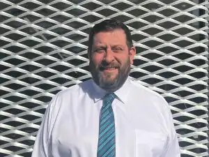 Richard Savage representing Donald’s dealership team.