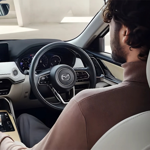 Closeup of Mazda CX 60 interior and steering wheel