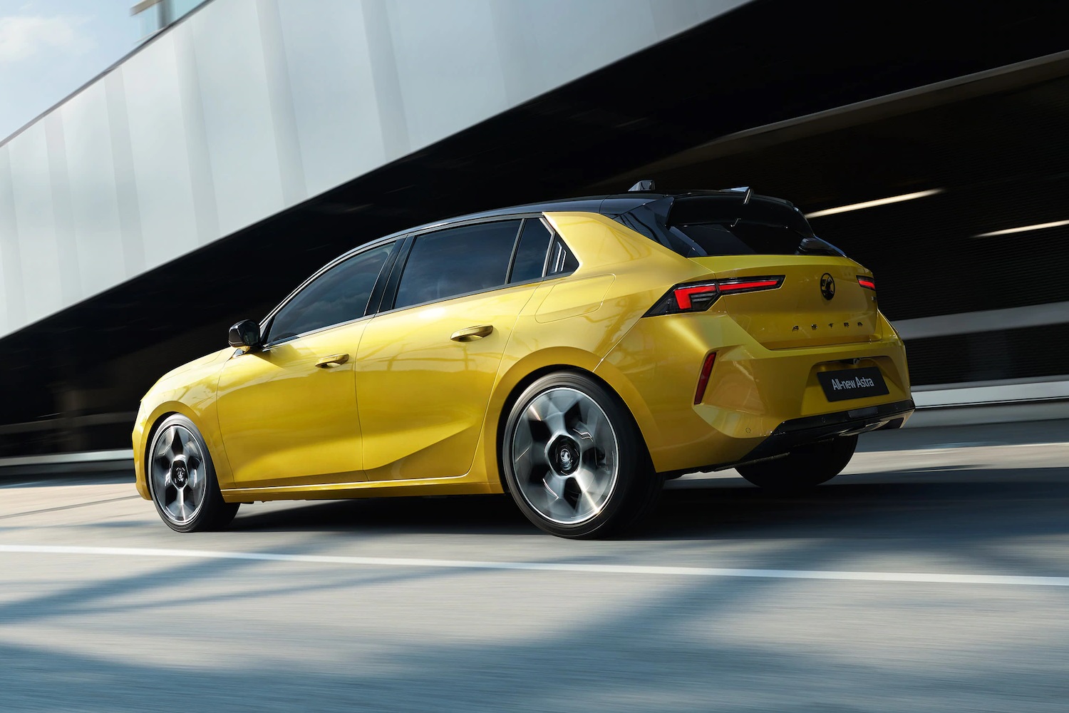 Vauxhall Astra Yellow being driven on the road