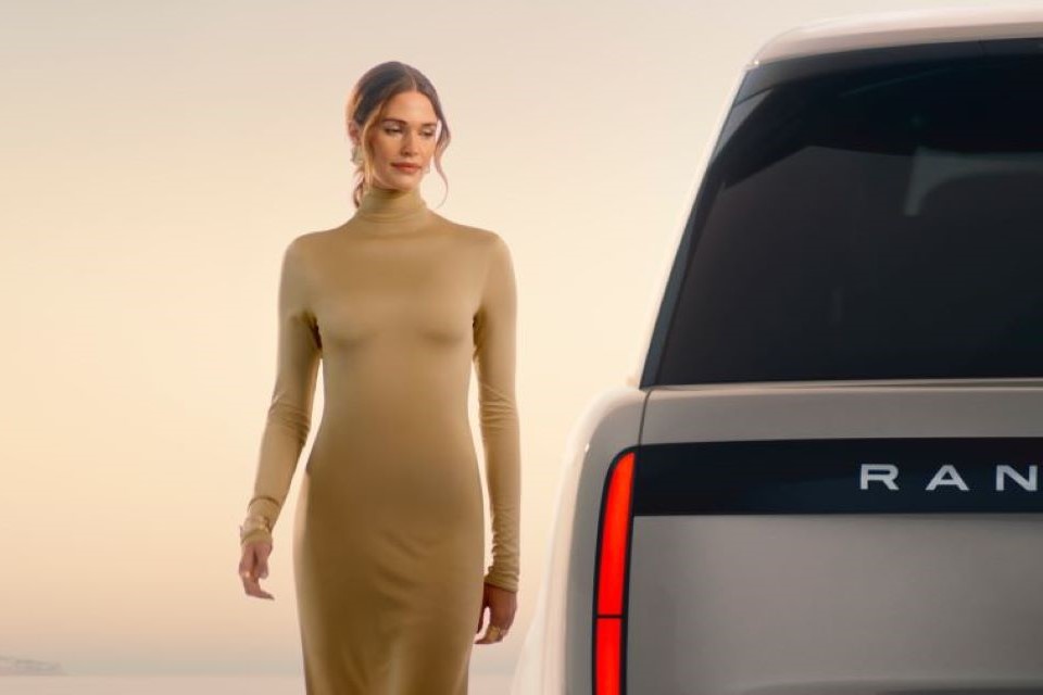 Person by Range Rover Vehicle