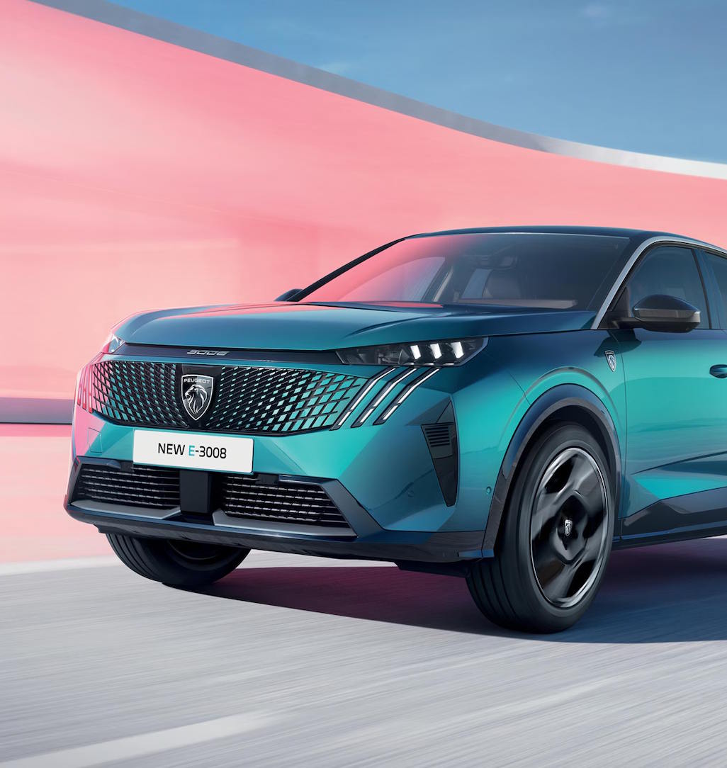 Front three-quarter view of the Peugeot E-3008 highlighting its futuristic styling and all-electric performance.