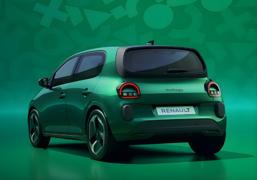 Rear view of Renault Twingo E-Tech electric city car in a green studio setting.