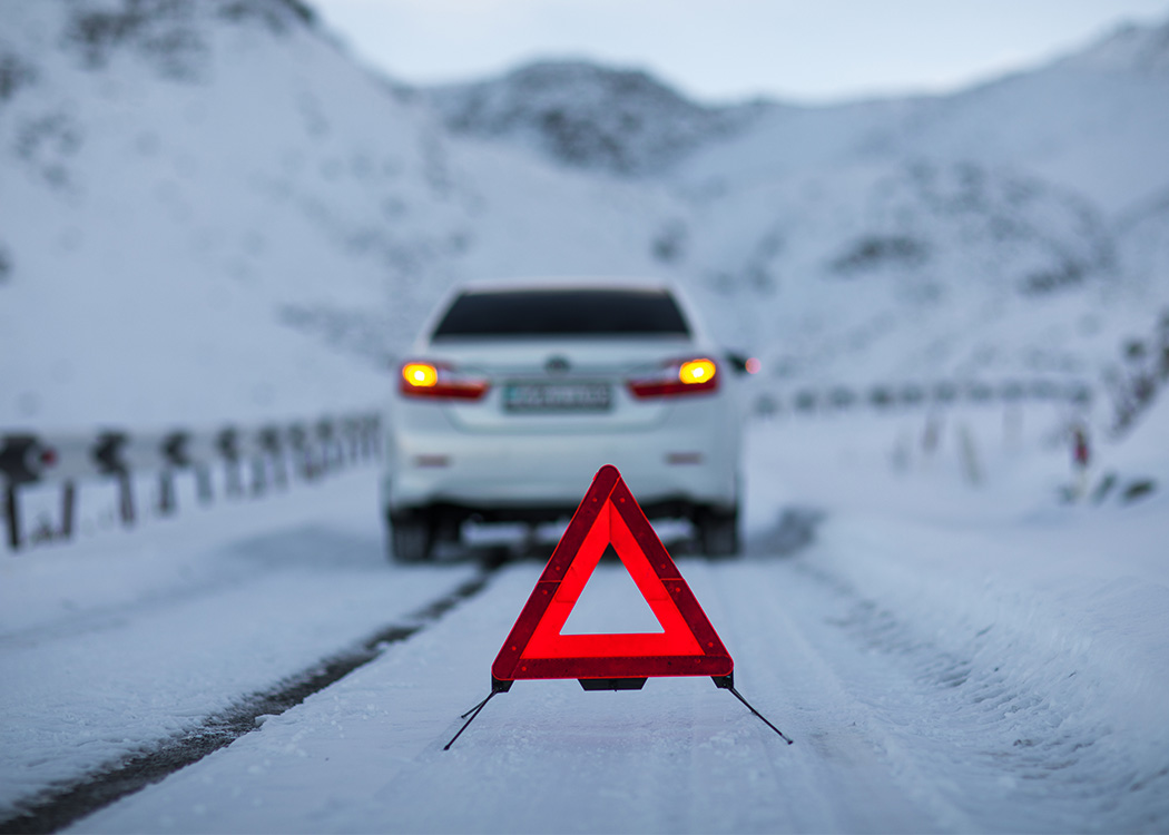 car reflective triangle on road