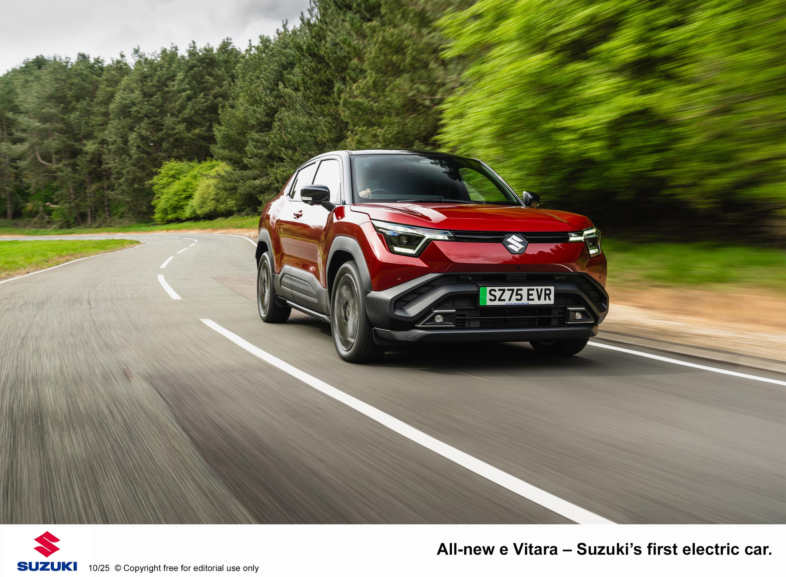 Red Suzuki e-Vitara on the road