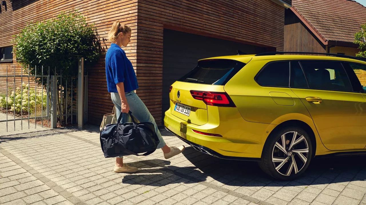 Yellow Volkswagen Rear Side View