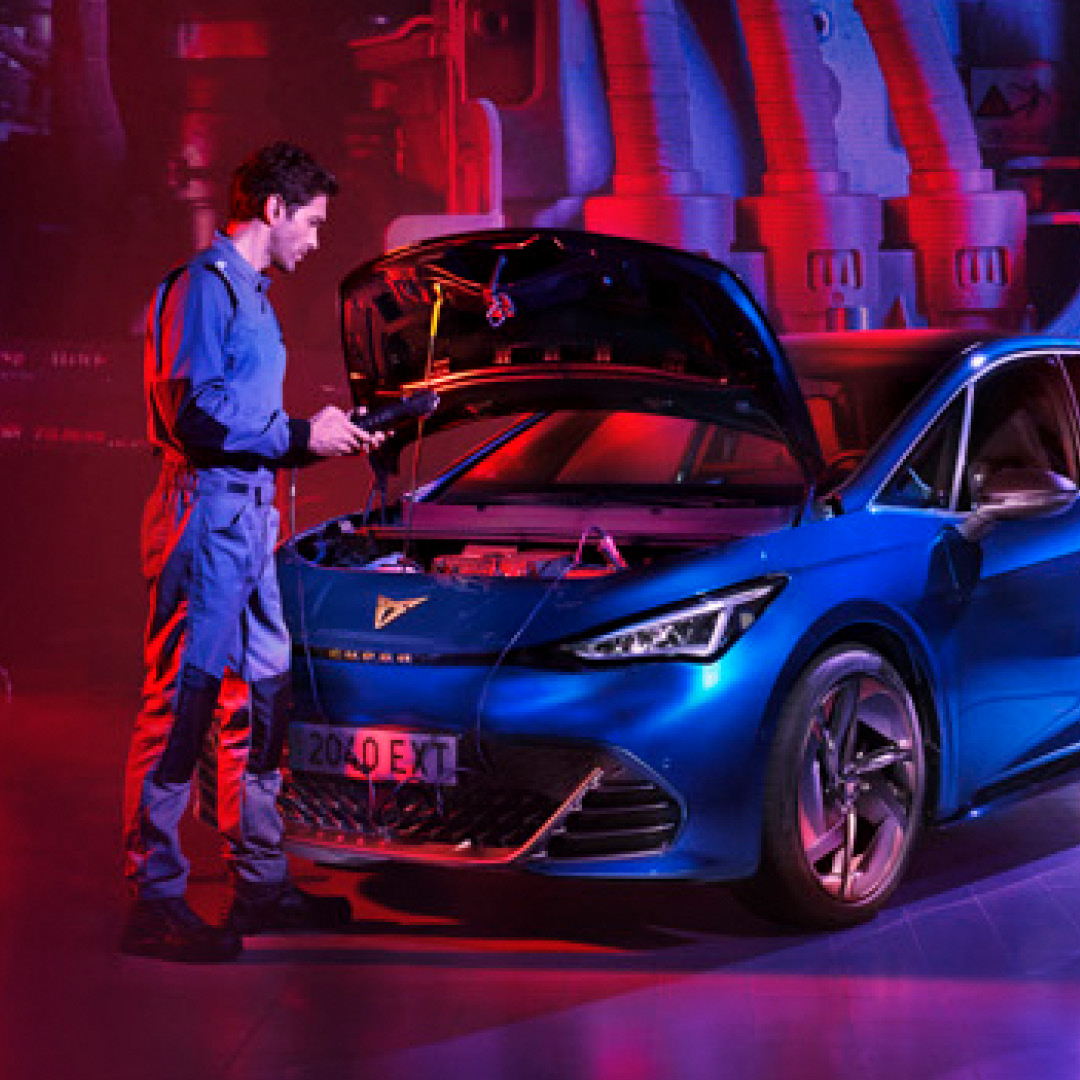 CUPRA Mechanic Inspecting Engine