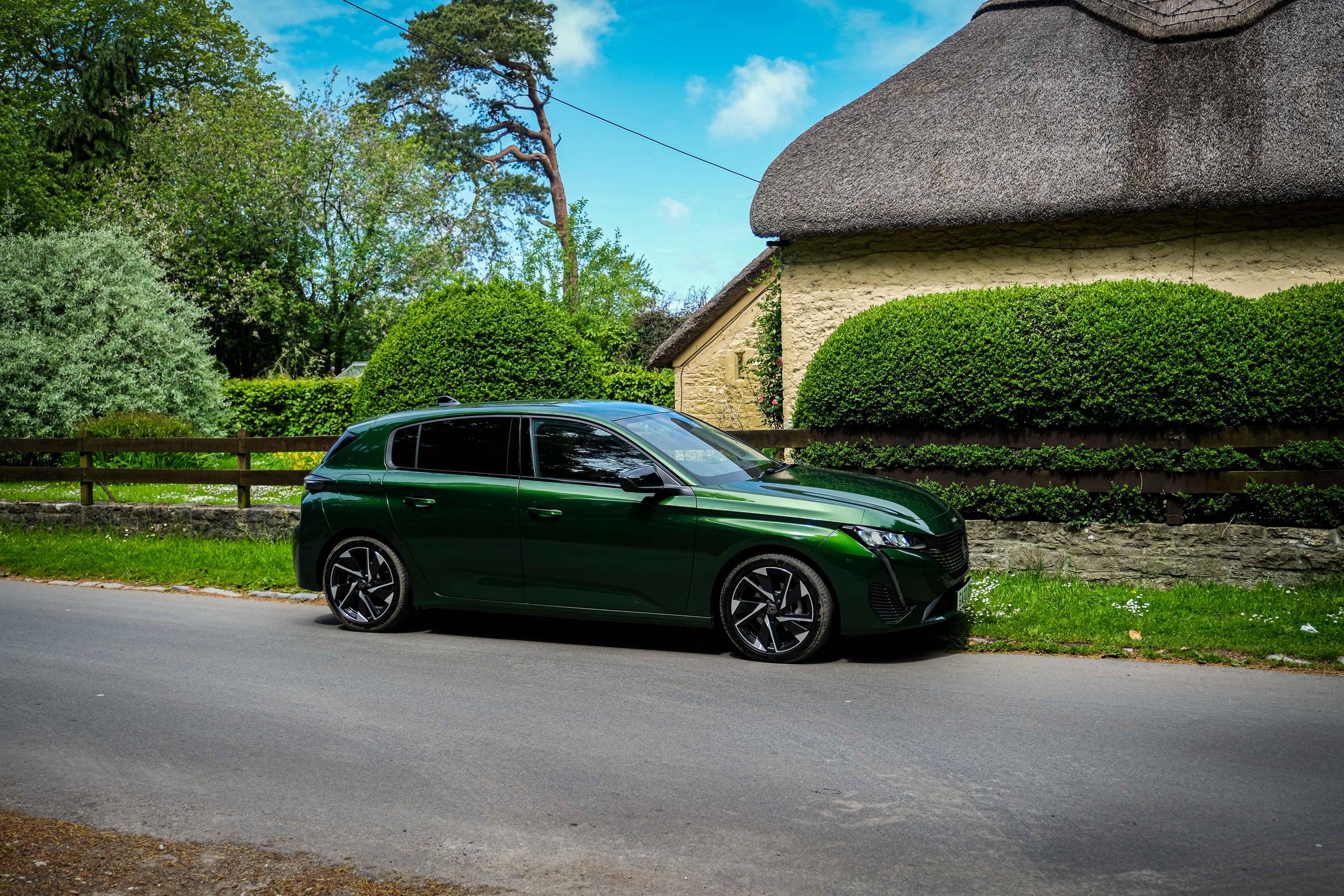 Green Peugeot 308 side on