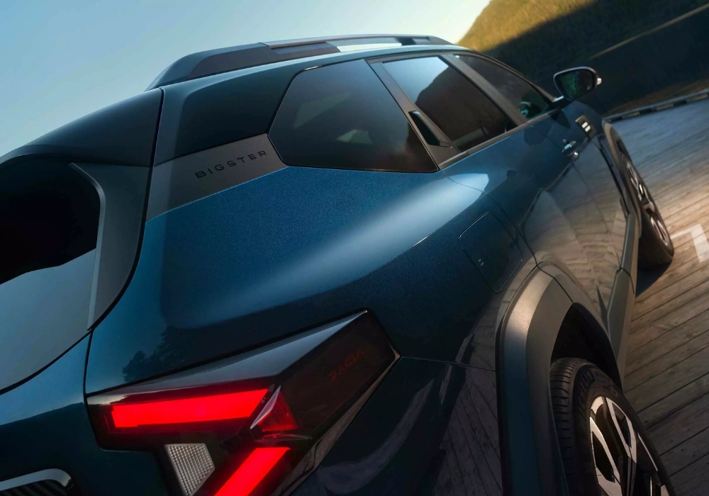 Dacia Duster rear quarter detail with taillight illuminated, highlighting sharp design elements and body lines.