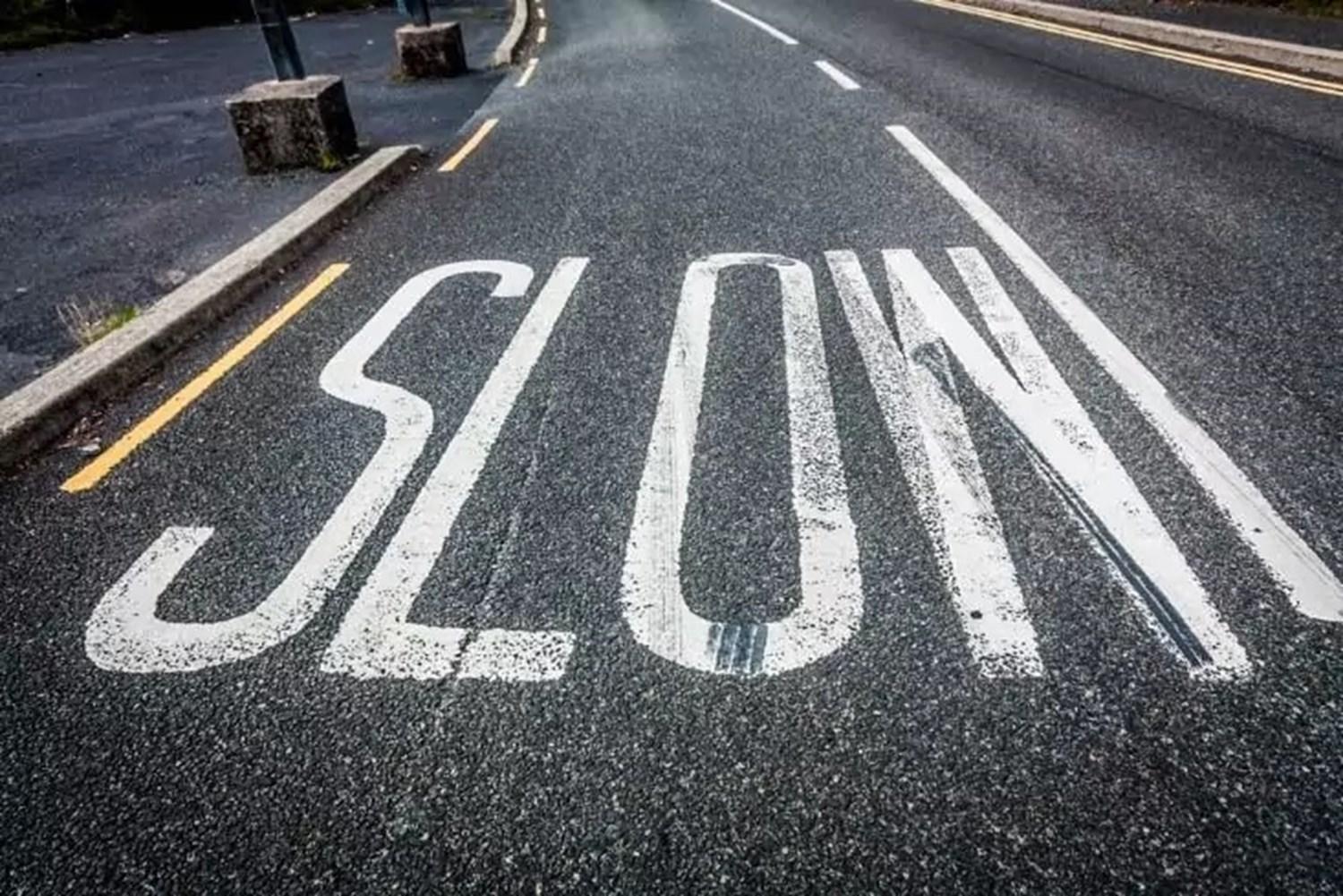 Slow Road Sign