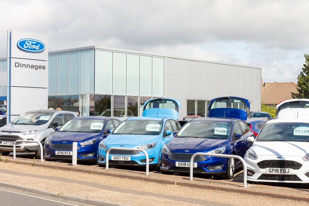 Dinnages Ford showroom with new Ford cars on display