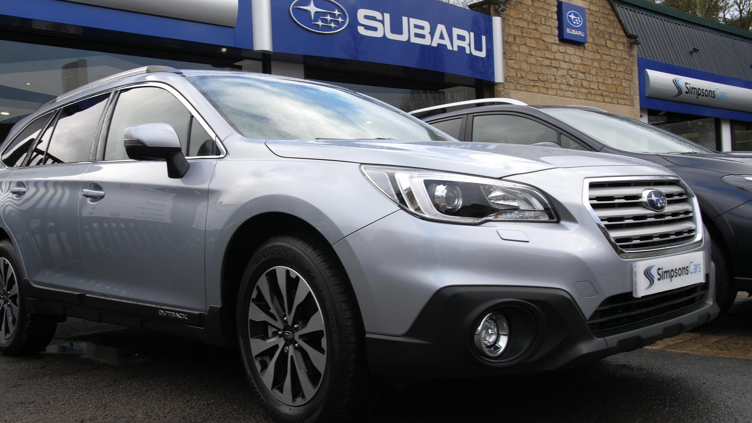 Parked Subaru by Simpsons cars Dealership