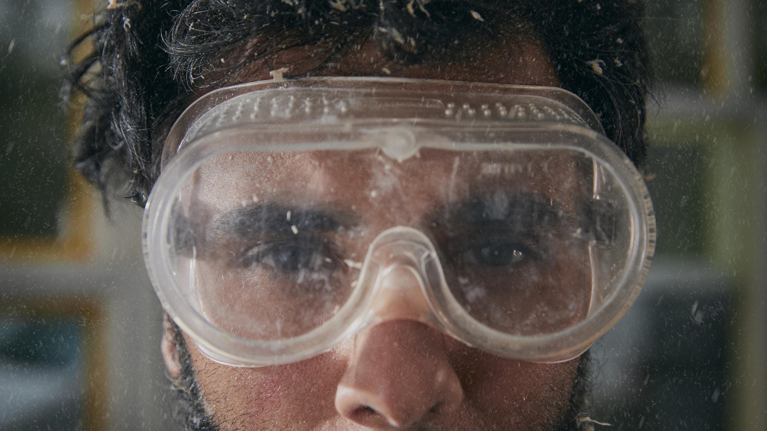 Volkswagen Mechanic Wearing Safety Goggles