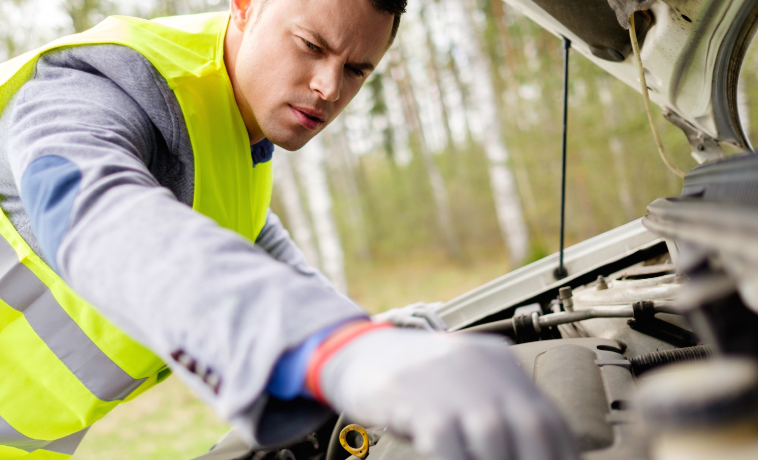 A mechanic working on a Motability car