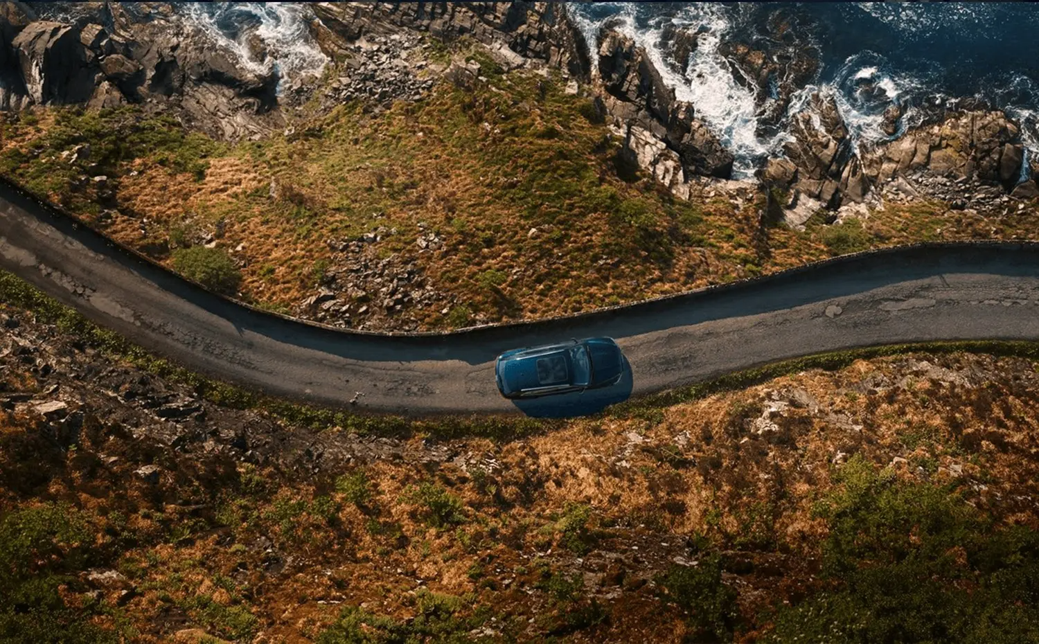 Audi Vehicle Birds eye view driving on road