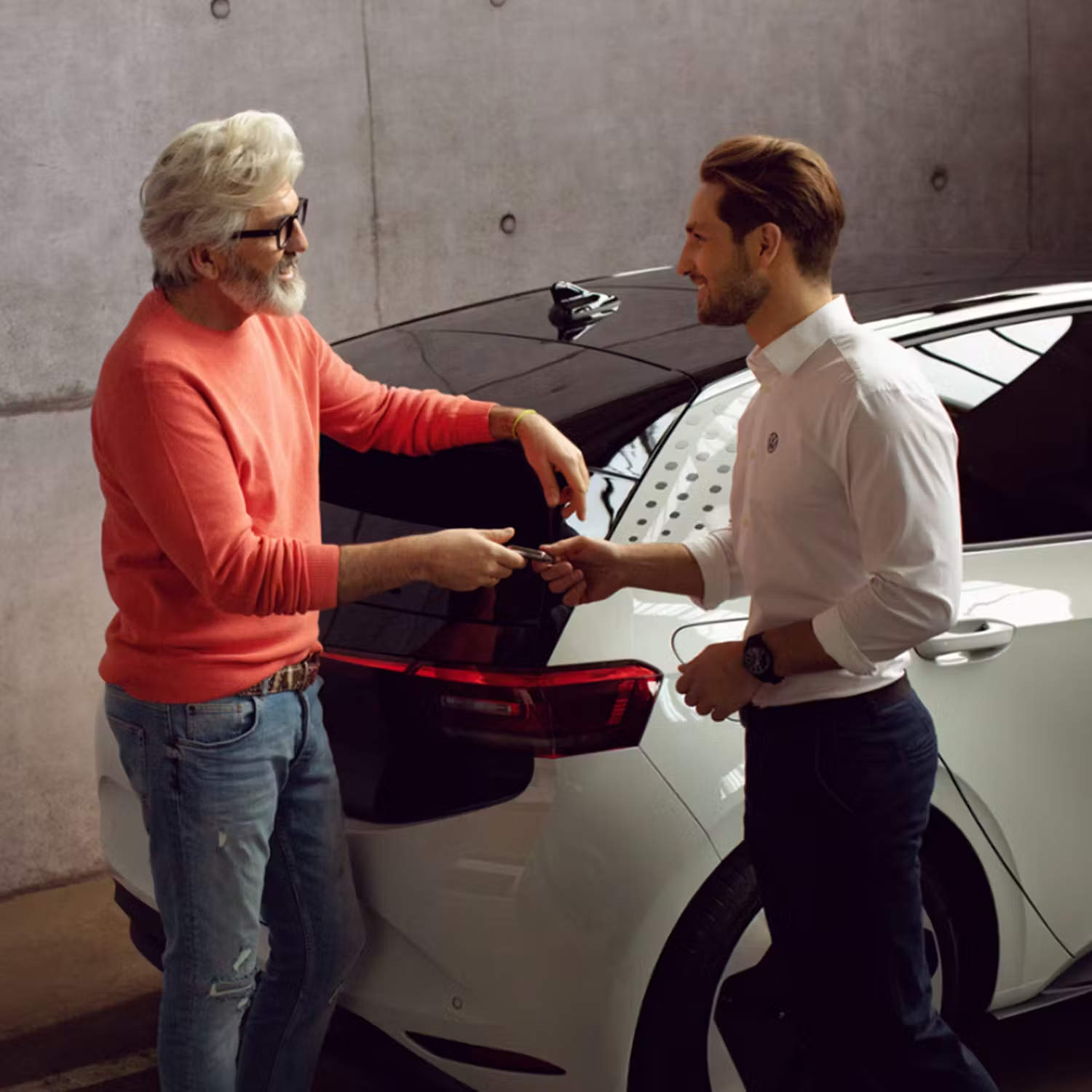 Customer shaking hands with salesmen
