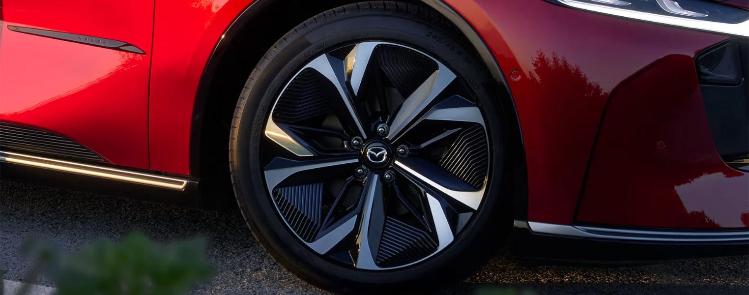 Close-up of Mazda6e alloy wheels with modern design.