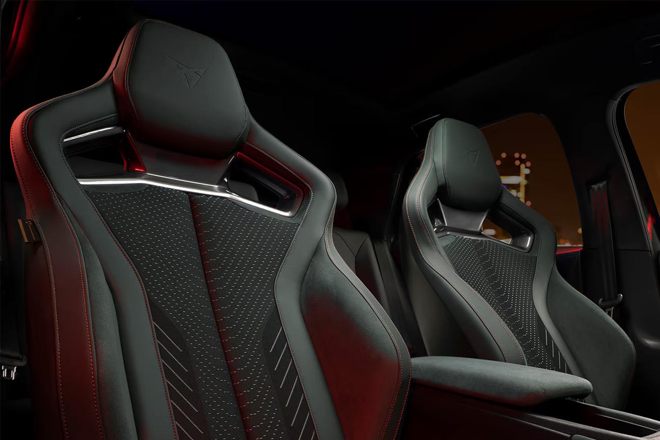 Close-up of the CUPRA Born’s sporty front seats with detailed stitching and integrated headrests.