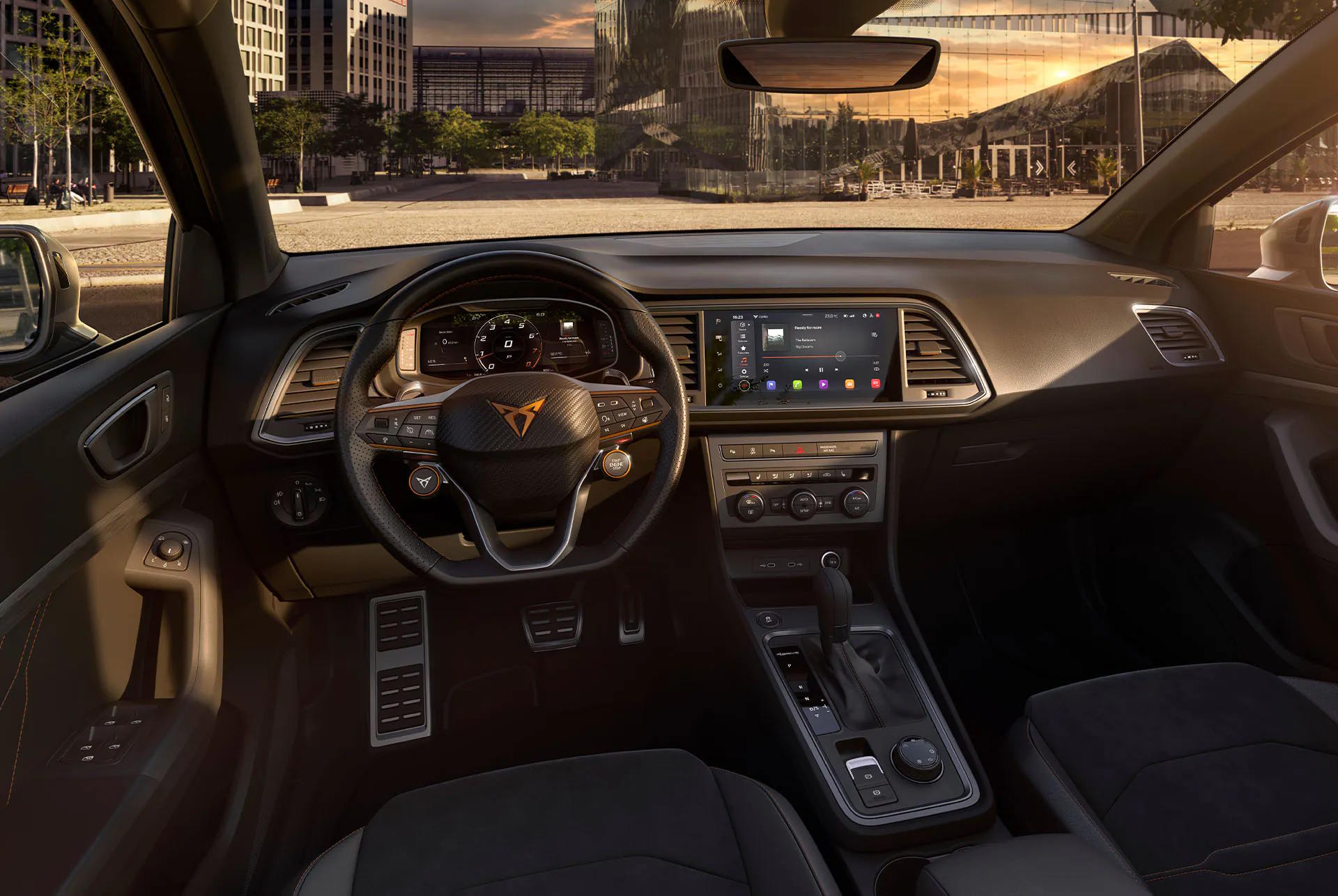 CUPRA Ateca interior featuring a sporty steering wheel, digital driver display and central touchscreen.