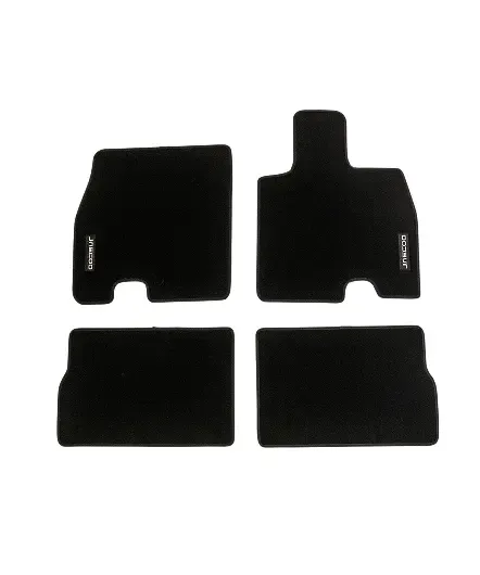 Set of four black car floor mats tailored for front and rear footwells, designed for protection and durability.