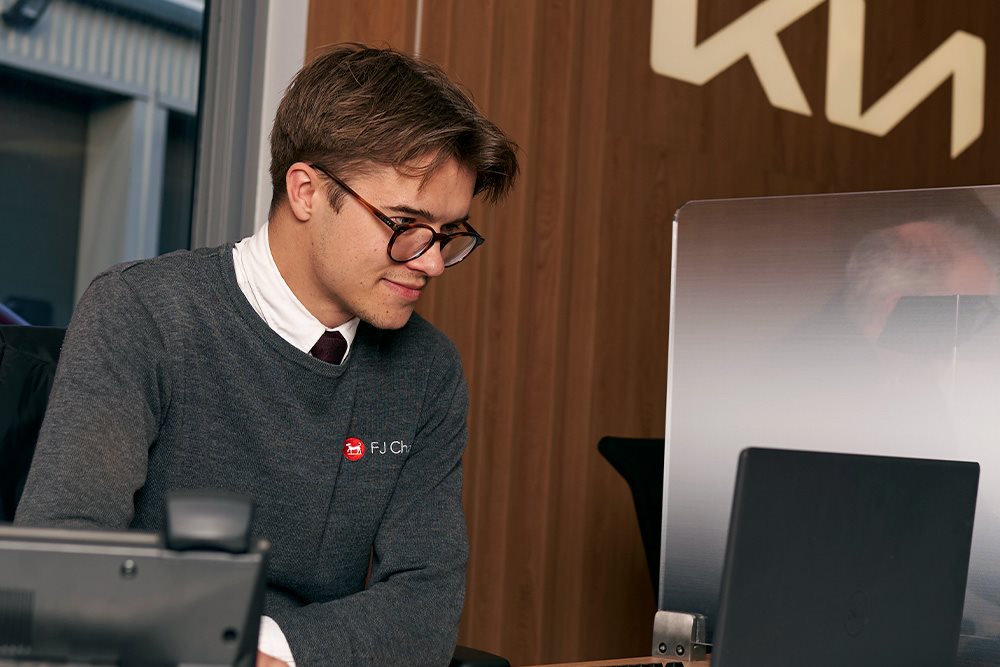 man looking at computer screen
