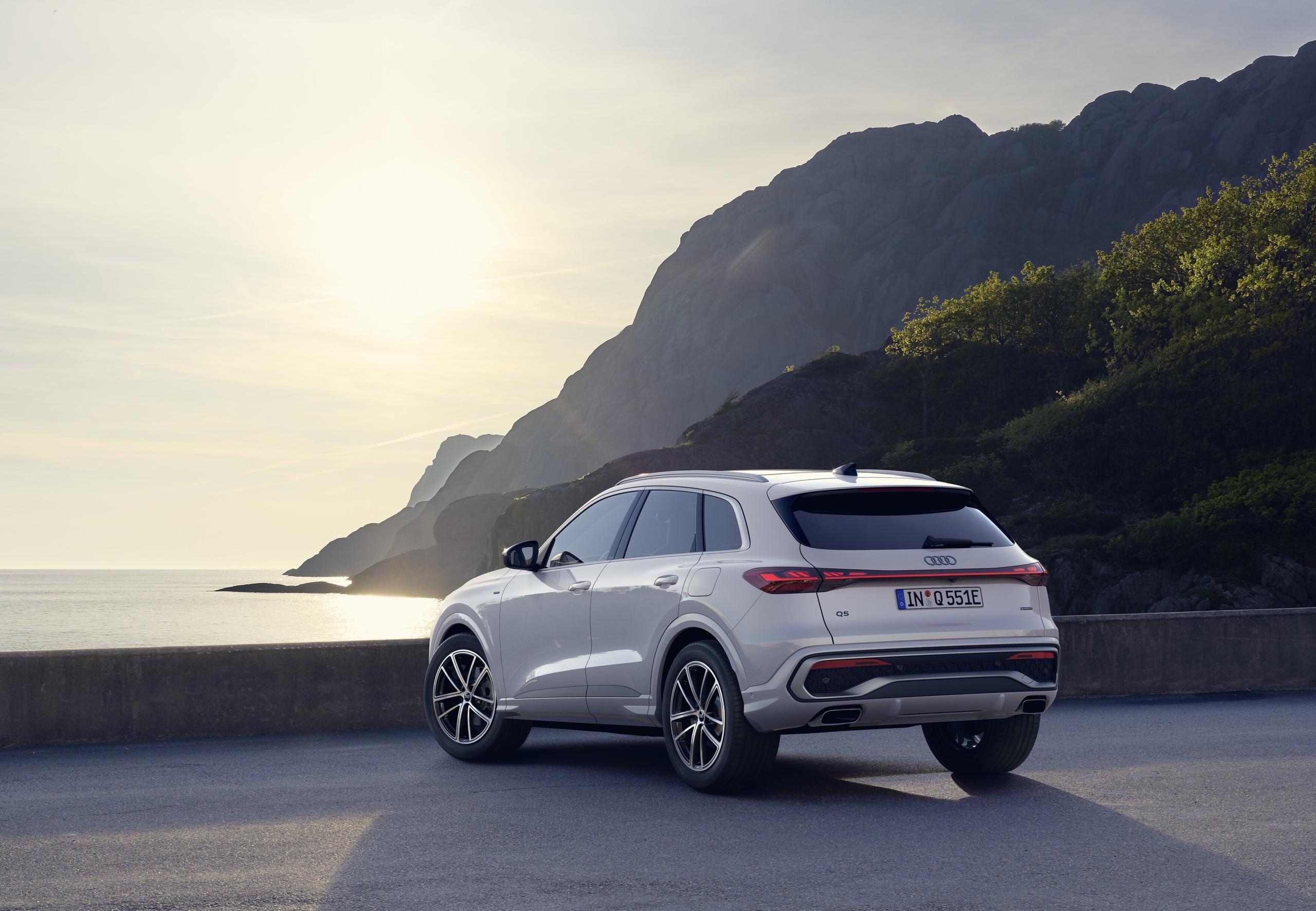 White Audi Q5 e-Hybrid Rear Side View