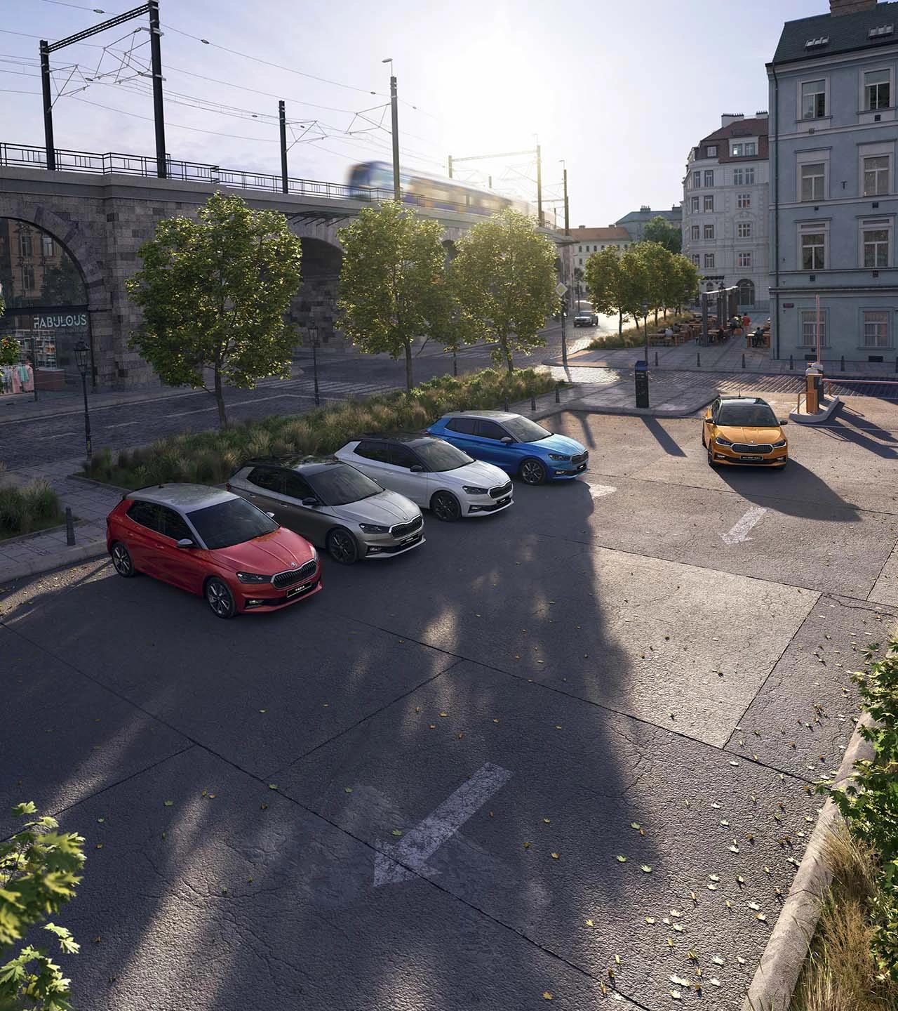 Several SKODA's parked in a car park
